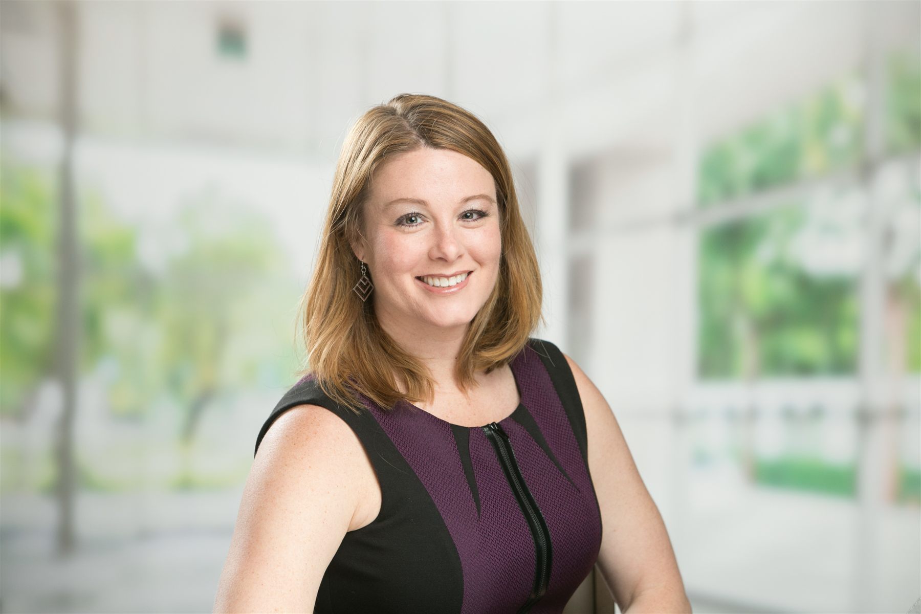 Headshot session on-site — studio backdrop and professional lighting at a hotel venue